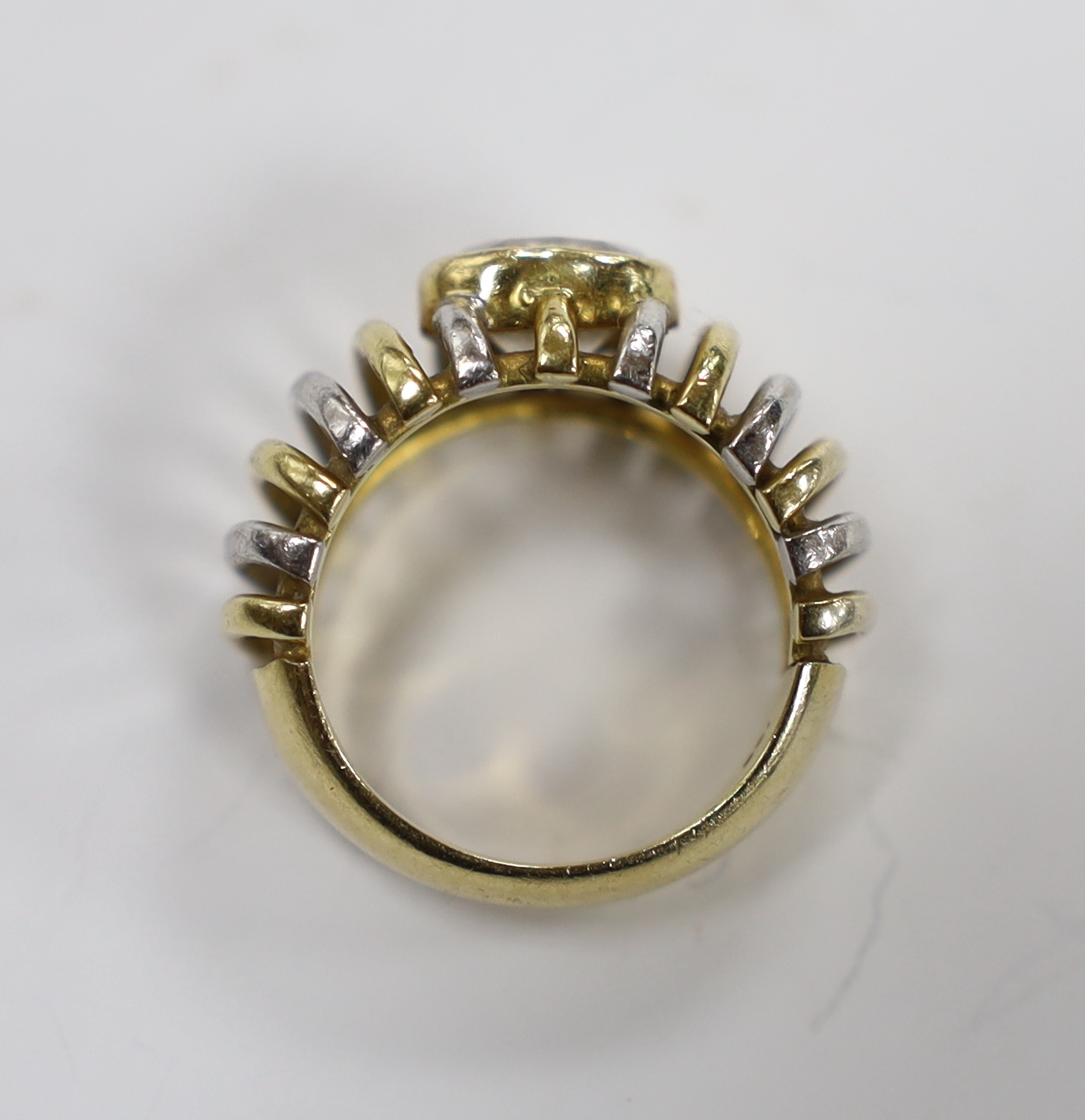 A modern pierced two colour 750 and single stone heart shaped simulated diamond set ring, size K, gross weight 9.4 grams.